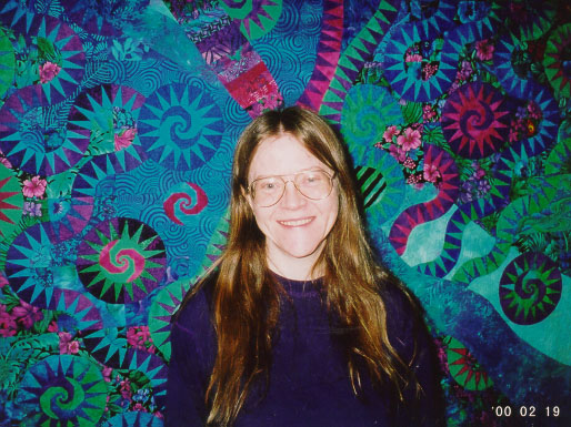 Jeri and one of her quilts
